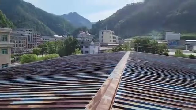 ACC membrane installed beneath a rooftop solar panel array, USA